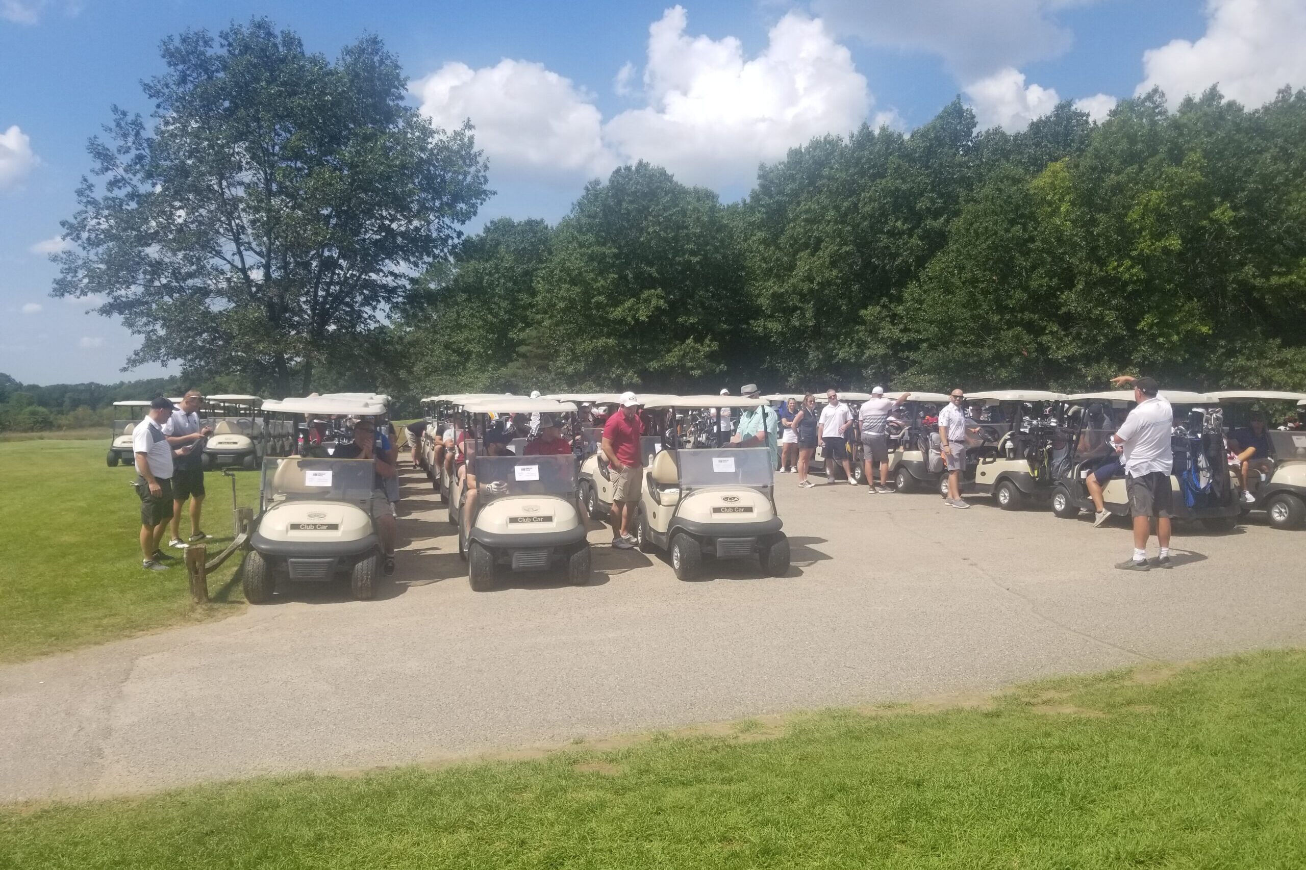 golf carts and golfers