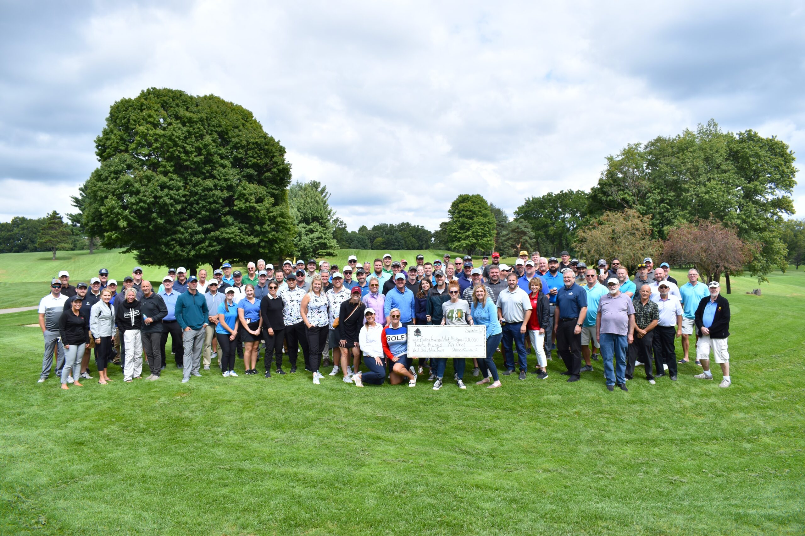 Mitten Brewing Foundation Annual Golf Outing check presentation